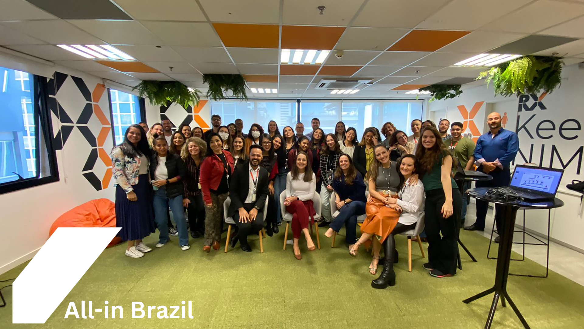 Team photo of Inclusion group: RX All-in Brazil ERG gathered together in the office HUB