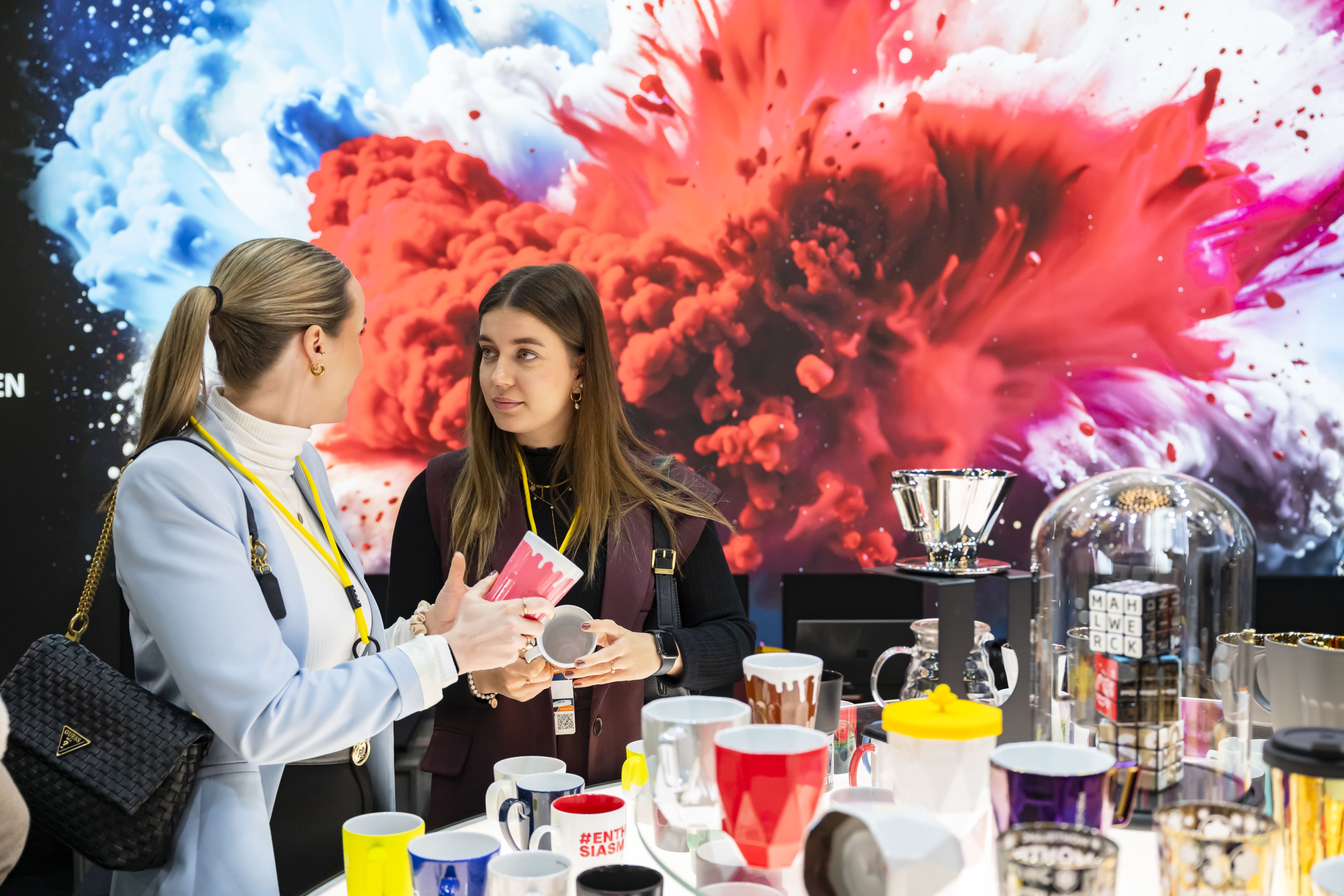 man performing DJ music with crowd during nighttime