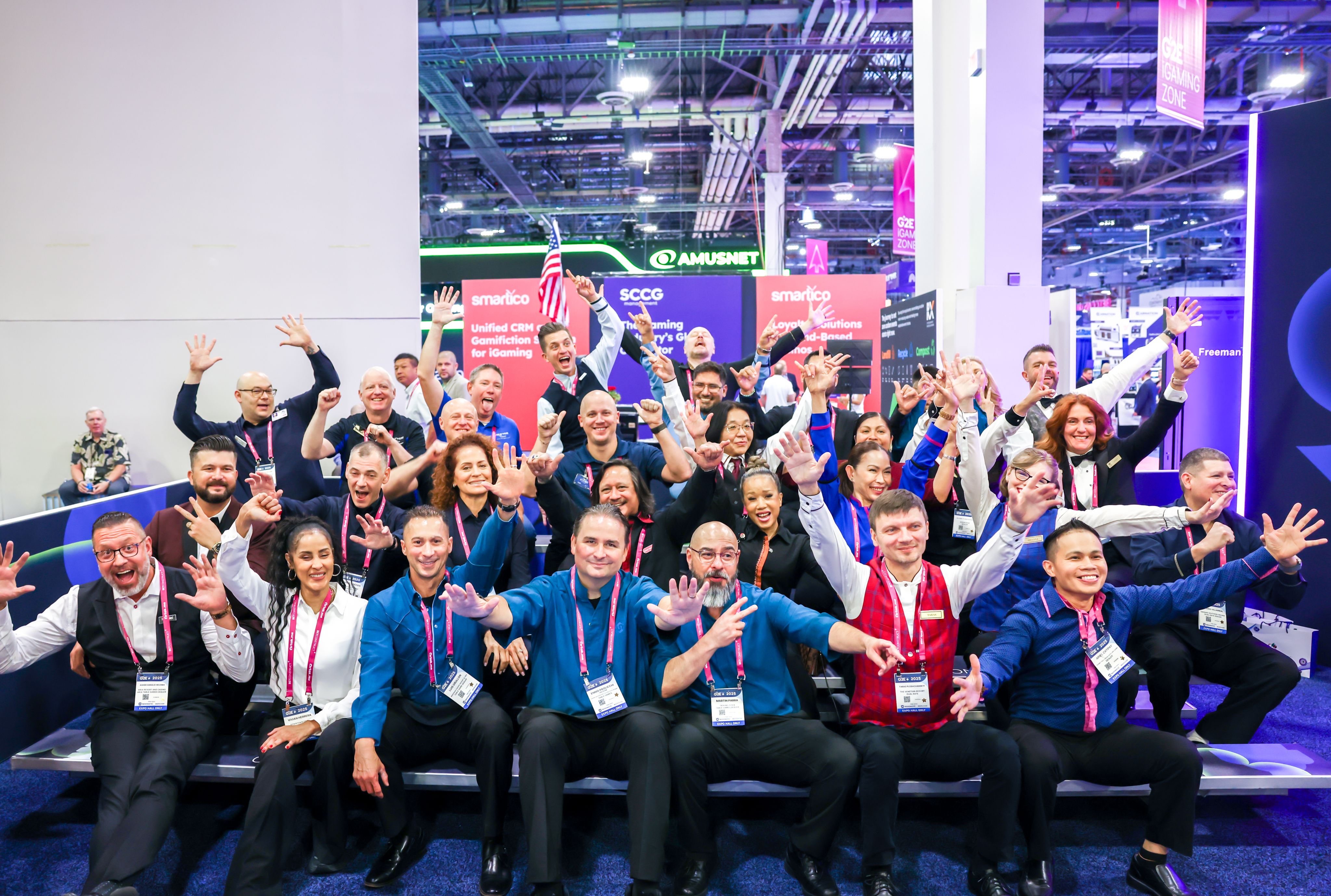 man performing DJ music with crowd during nighttime