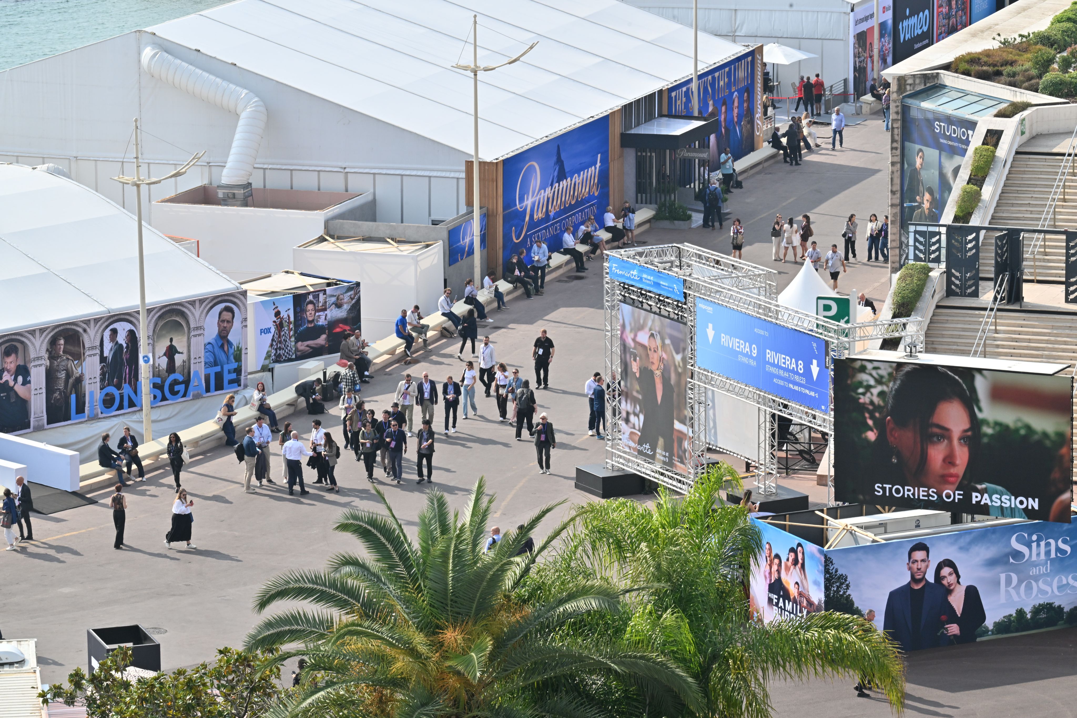 a black and white photo of people on a stage